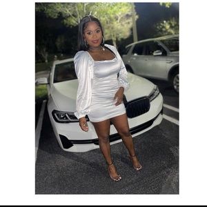 White puffy sleeve,low cut back dress dress,slightly worn.